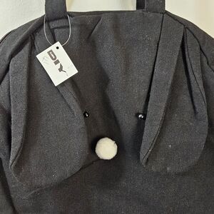 Black Canvas Backpack with White Accent